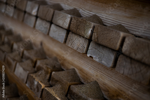 Several pallets stacked, viewed from the side, in 