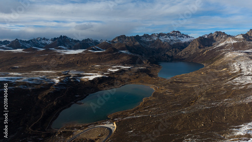 Frozen Sister Lakes in Tibet During Winter, Scenic Alpine Landscape in Western China