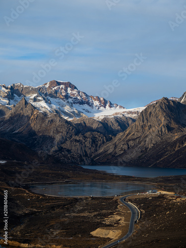 Frozen Sister Lakes in Tibet During Winter, Scenic Alpine Landscape in Western China