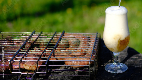Bild auf Leinwand beer with grilled sausages