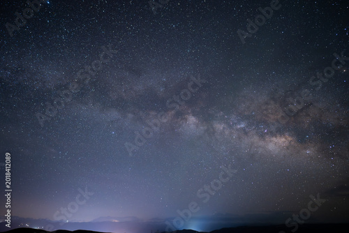 Person Watching the Milky Way Under a Starry Sky, Exploration and Cosmic Adventure Concept