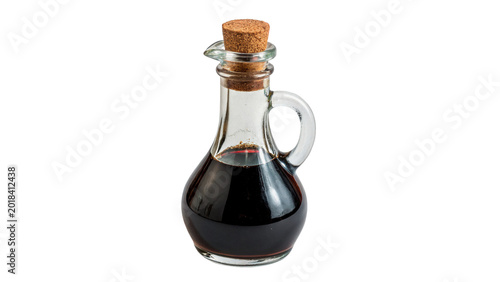 Bild auf Leinwand Small glass bottle with dark balsamic vinegar or soy sauce for kitchen culinary