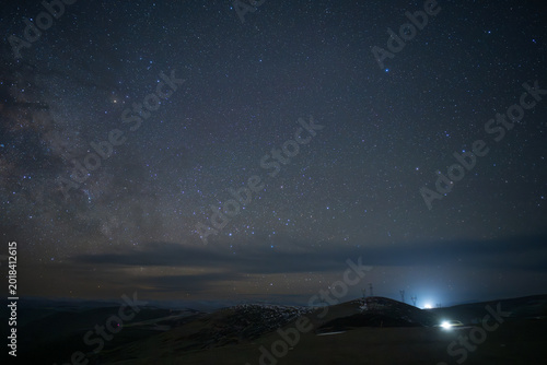 Person Watching the Milky Way Under a Starry Sky, Exploration and Cosmic Adventure Concept