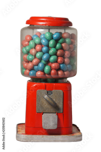 A retro gumball machine filled with colorful candies