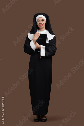 Portrait of young nun with ...