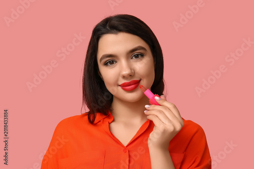 Beautiful young woman with ...
