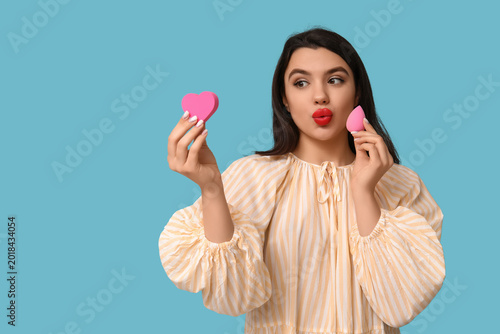 Beautiful young woman with ...
