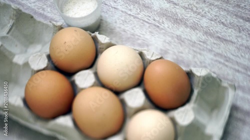takes a few eggs from the package