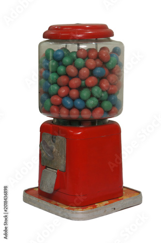 A vintage candy machine filled with colorful candies