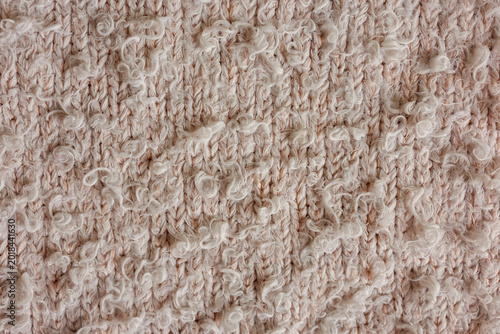 Pink fantasy boucle knitted fabric texture close up