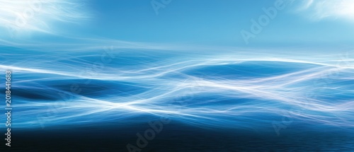 Ethereal blue waves with luminous highlights under a soft sky
