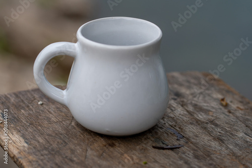 White Ceramic Mug on Rustic Wooden Table Minimal Cozy Coffee Cup Close Up
