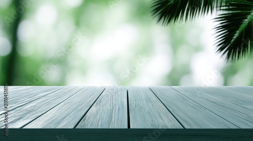 Wooden surface foreground with soft green blurry background and foliage