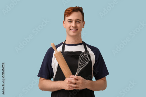 Male confectioner in apron ...