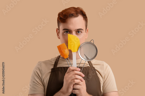 Male confectioner in apron ...