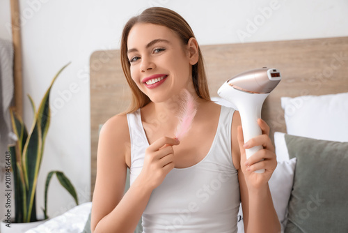 Young woman with modern pho...
