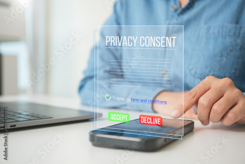 Fotografie User giving privacy consent on smartphone screen person accepting digital terms and conditions for data protection online security and mobile app compliance