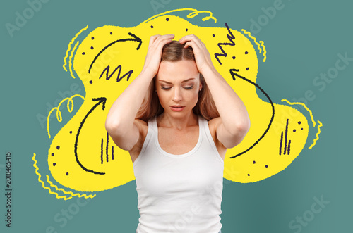 Cuadro en lienzo Woman feels stress while standing against a colored background with swirling lin