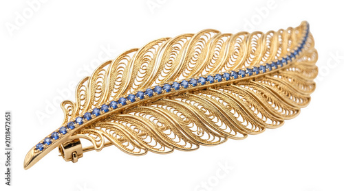 Vintage gold feather brooch with sapphire accents