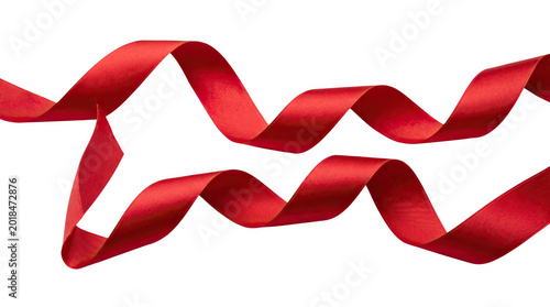 Crimson satin ribbon flowing against black background