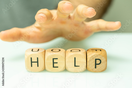 A hand reaches out to grasp...