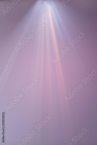 purple foggy background with colored laser glow. Copy space 
