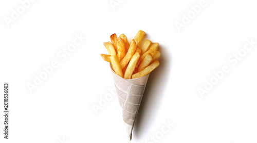 Crispy golden french fries in paper cone isolated on white background