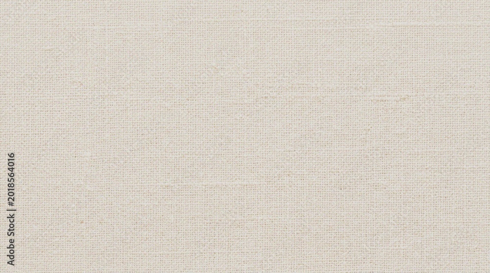 Fototapeta premium A beige colored textured fabric background.