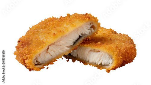 Photos Golden crispy breaded fish fillet cut open revealing flaky white flesh