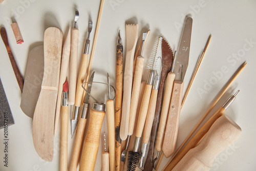 Flat Lay Arrangement of Professional Pottery and Clay Sculpting Tools for Ceramic Art