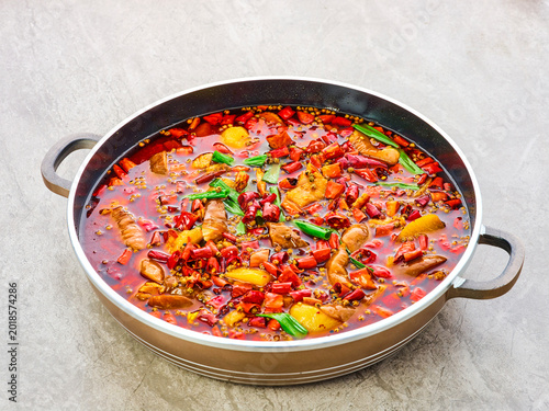 Fotografie bullfrog and fish head hot pot