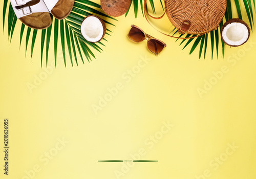 Tropical Paradise Essentials: An overhead shot captures a curated collection of summer essentials, evoking the spirit of sun-kissed vacations and carefree relaxation.