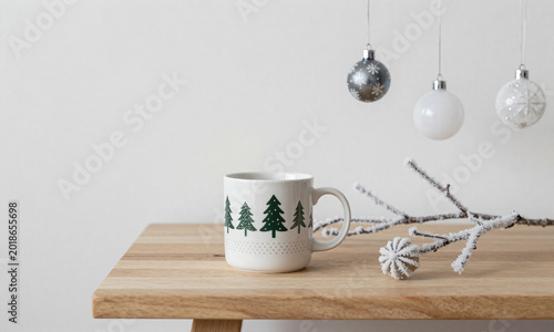 simple scandinavian decor features festive mug delicate hanging ornaments frosted branch minimalist wooden