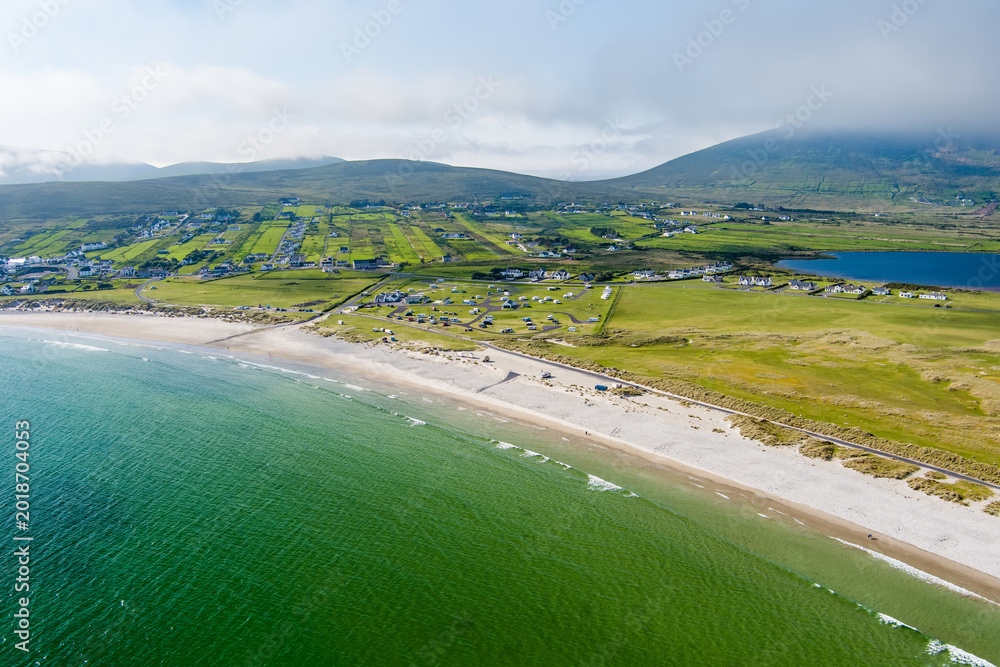 Naklejka premium Aerial view of Keel Beach on Achill Island, County Mayo, Ireland. Turquoise Atlantic water, white sand and low cloud along the Wild Atlantic Way.