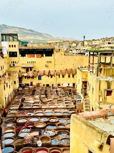 Cuadro en lienzo Aerial view of traditional Chouara tannery with leather dyeing vats and workers
