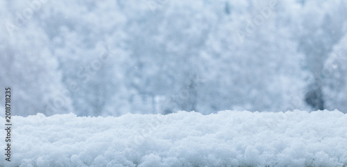 Winter background for product. Snow accumulation covering flat surface during falling snowflake
