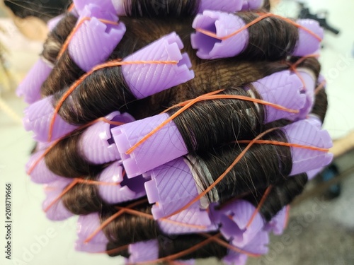 Curl your hair into beautiful, fashionable waves using various curling techniques.