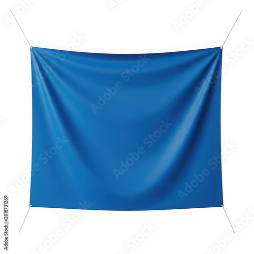 Solid blue curtain hanging on window