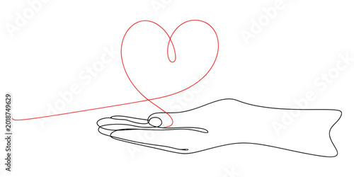 Photos A single continuous line drawing of a human hand holding a red string heart shap