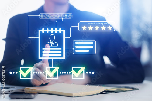Professional evaluates job candidate with digital assessment tools in office setting during working hours