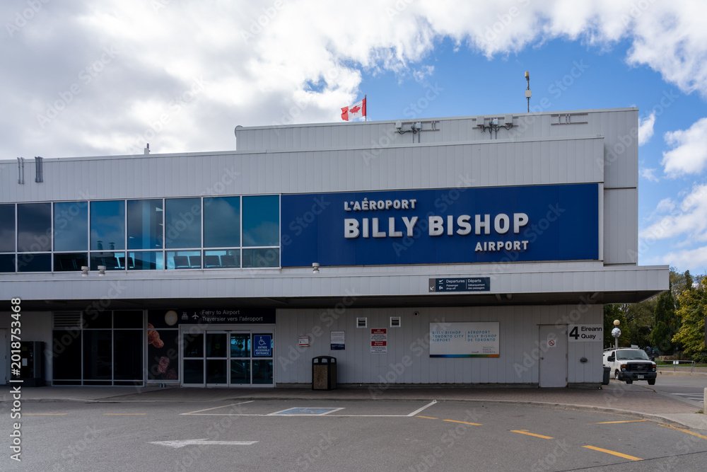 Naklejka premium Toronto, Canada - October 16, 2024: Billy Bishop Toronto City Airport on Toronto Islands in Toronto, Ontario, Canada. Billy Bishop Airport (BBTCA) Is a regional airport.
