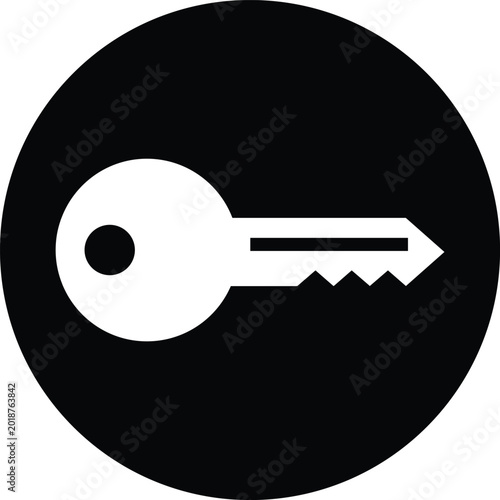 White key on black circle symbol