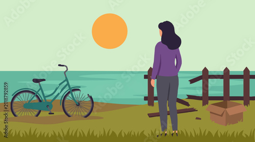 Woman stands by the sea, observing a damaged bicycle and broken fence