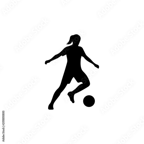 Silhouette of a female soccer player dribbling the ball.