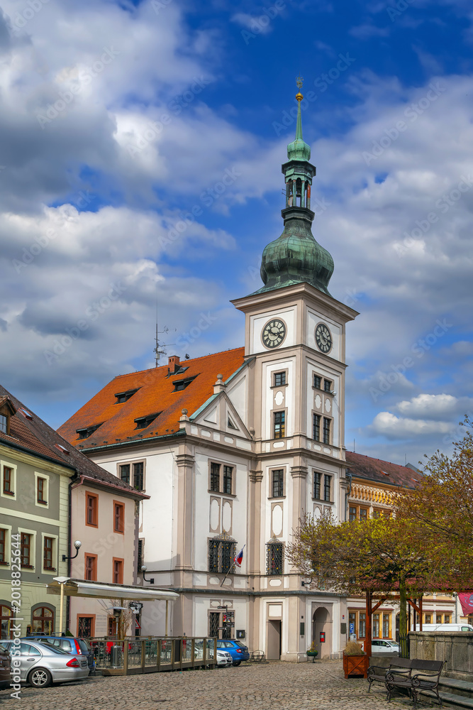 Fototapeta premium Historic Town Hall in Loket, Czech Republic. Baroque architecture building under blue sky with white clouds