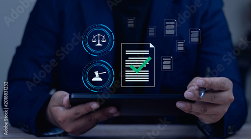 Bild auf Leinwand Businessman using tablet for legal and regulatory compliance