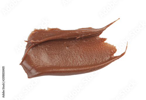 Foto Brown smear of chocolate cream isolated on white background