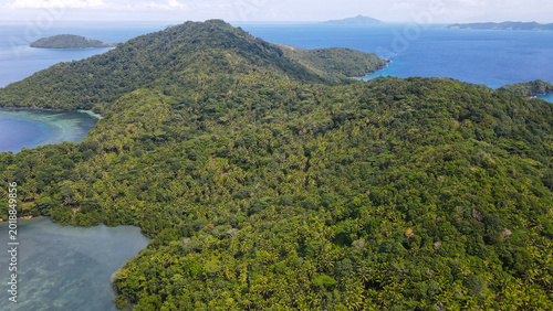 Quadro su tela Aerial View of Coastal Village and Tropical Beach at Pulau Para 1, North Sulawes