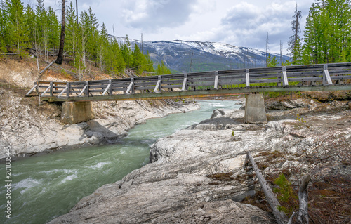 Wooden footbridge over the Kootenay River in Kootenay National Park, British Columbia, Canada