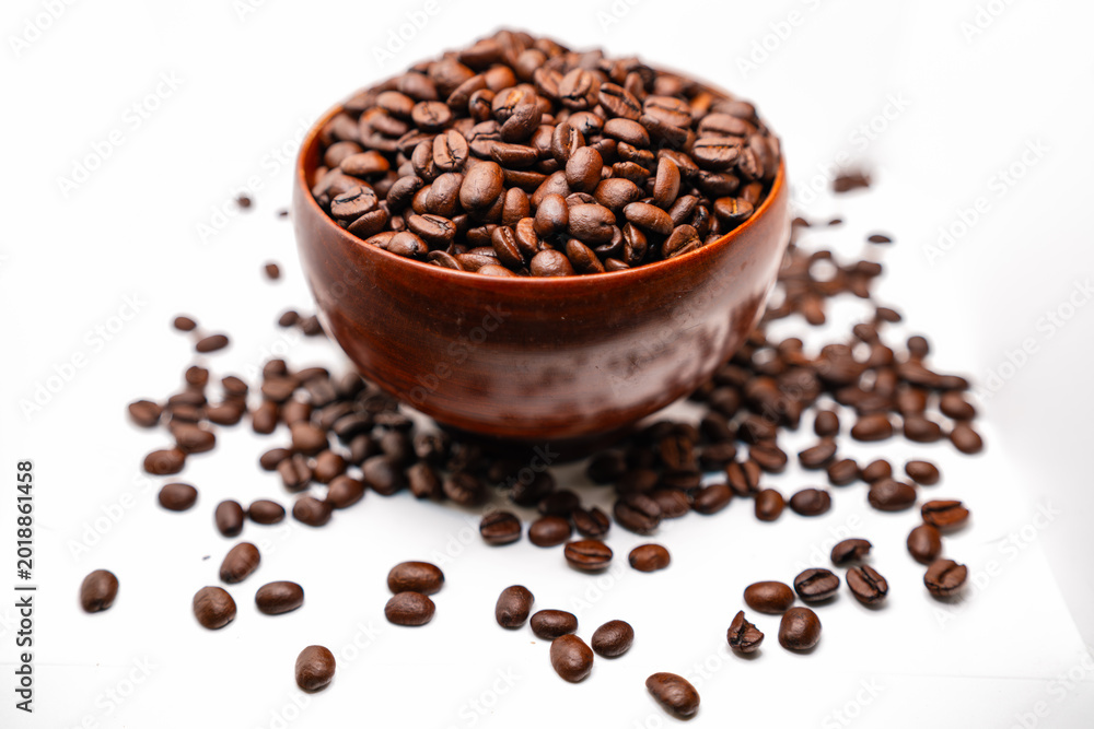 Fototapeta premium coffee beans in a cup